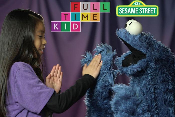Cookie Monster loves playing Pat-a-Cake with Mya, but he has ONE minor change.... 