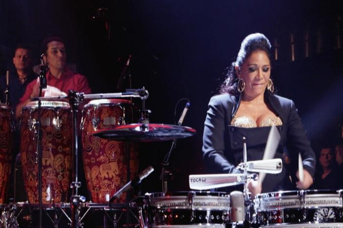Hear Latin-infused arrangements of iconic songs in this concert special.