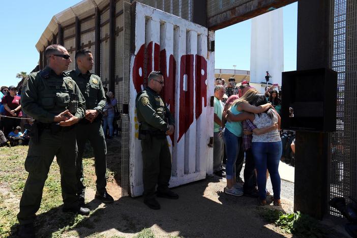 Families separated by the border share hugs and tears at special reunion