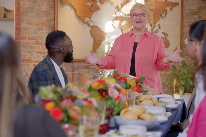 Lidia organizes a potluck-style meal where immigrants share cuisine from their cultures.