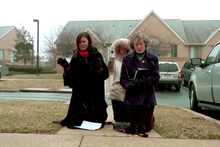 Protestors make a personal attack on Dr. Carhart and the owner of his clinic's property.