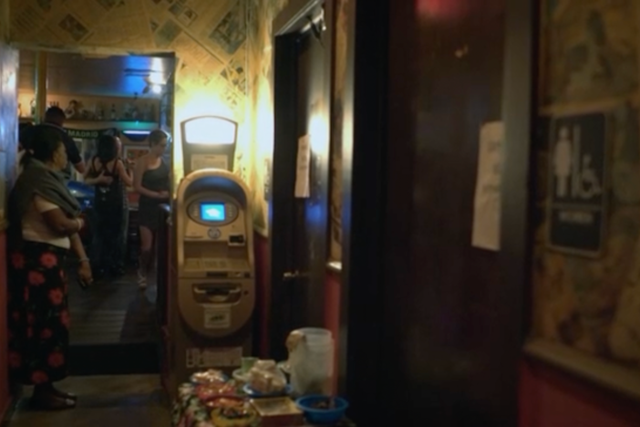 This Miami bathroom attendant keeps the club vibes friendly.