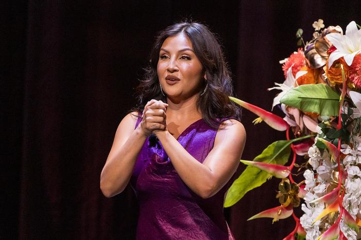 Host Annie Gonzalez introduces the Celebration of the Legacy of Roberto Clemente.