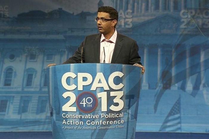 The president pardons Dinesh D’Souza.