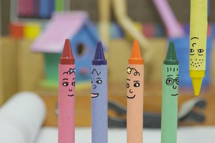 An animation of 5 multi-colored crayons who work together to draw the number 5.