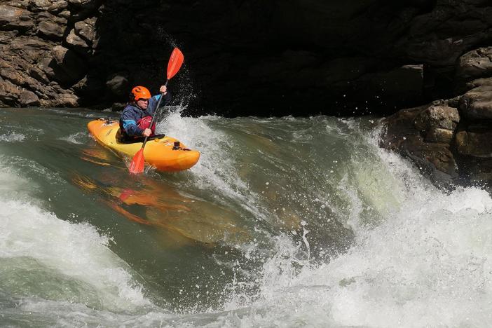 Fighting some of the most intense rapids yet, the team comes across a large drop.