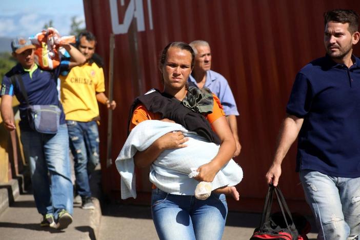With newly reopened border, Venezuelans flood into Colombia