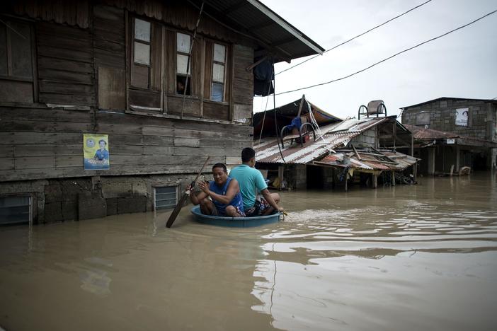 News Wrap: Typhoon Mangkhut death toll grows