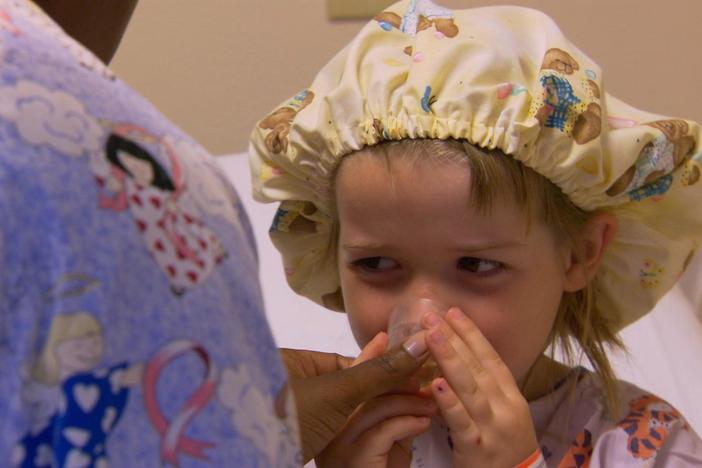 The five-year-old receives care in a hospital because few Florida dentists accept Medicaid