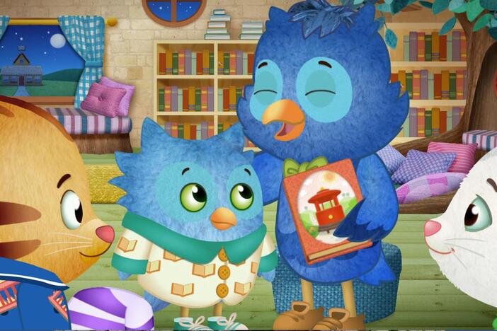 X the Owl reads a story about Trolley.