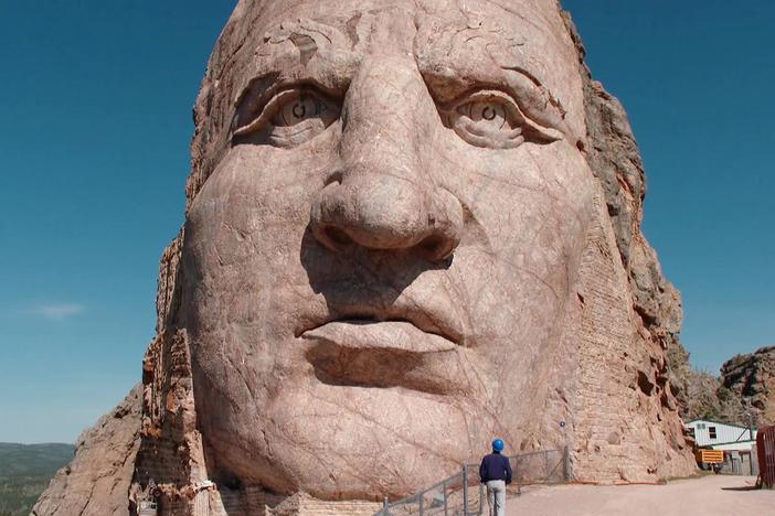 The relevance of a larger-than-life monument of Crazy Horse in the Black Hills of SD.