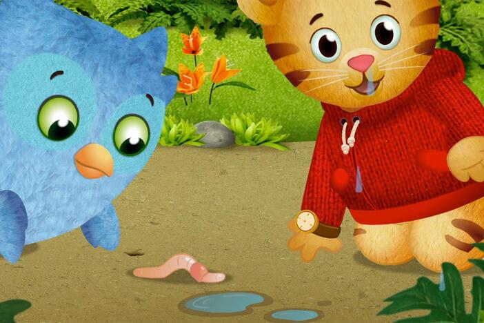 Even though it's raining, Daniel and O don't want to stop exploring.