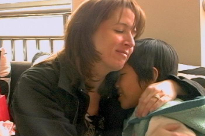 Fang Sui Yong meets her new adoptive mother for the first time.