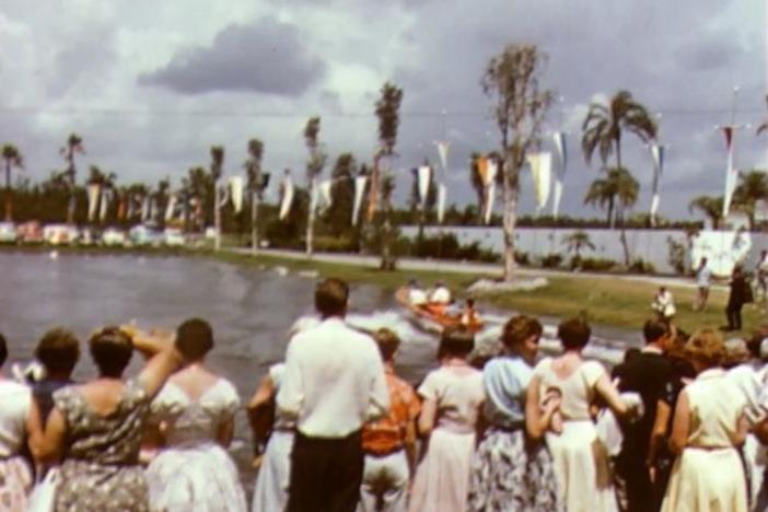 The Wish Fairy grants a sleek wish to a 1956 Jubilee attendee.