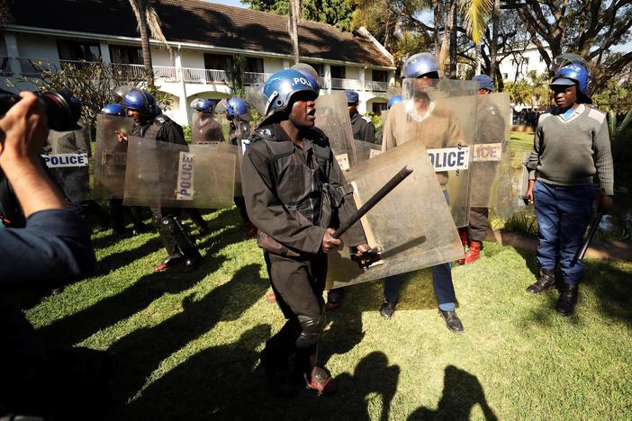 Mnangagwa, disputed winner of Zimbabwe election, urges unity