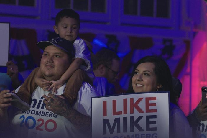 An organizer from the Rio Grande Valley prepares for a campaign rally in San Antonio.