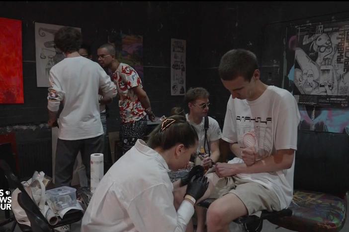 Patriotic tattoos become a liability for Ukrainians amid reports of Russian torture