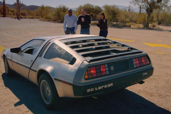 The volunteers are surprised by a DeLorean and demonstrate a time traveling experiment.
