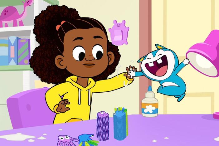 Lyla teaches Stu how to make a hand craft that can be a jellyfish or bird.