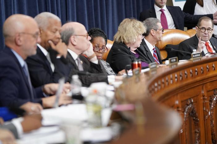 Lawmakers battle over impeachment in contentious markup