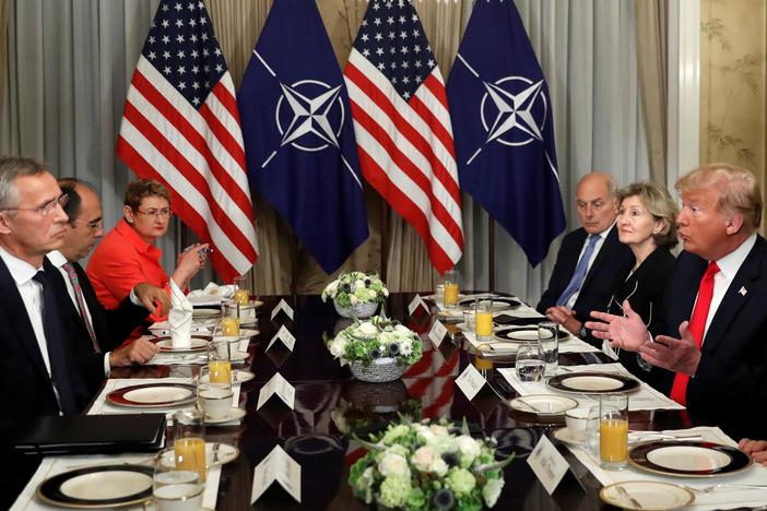 Trump sets combative tone at NATO with attacks on allies