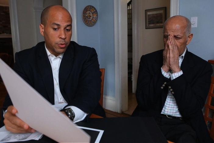 Cory Booker learns about the origin of the Booker family name.