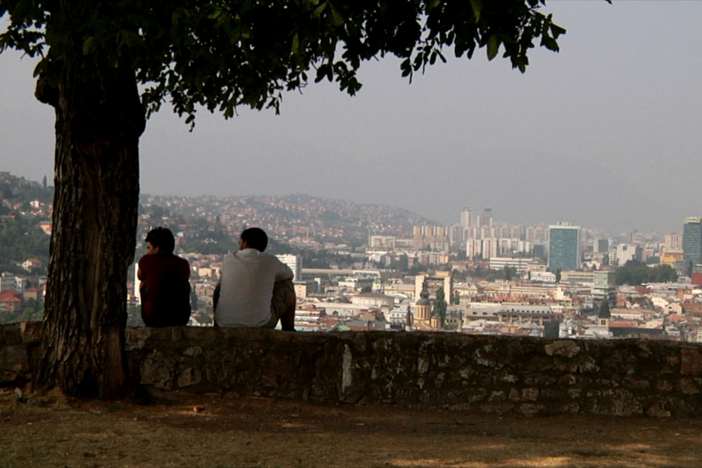 Cinematographer Johnson is shooting b-roll footage of Sarajevo, Bosnia, including the...