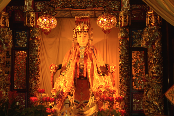 Our Chinese crew manipulate a 20ft crane into this temple.