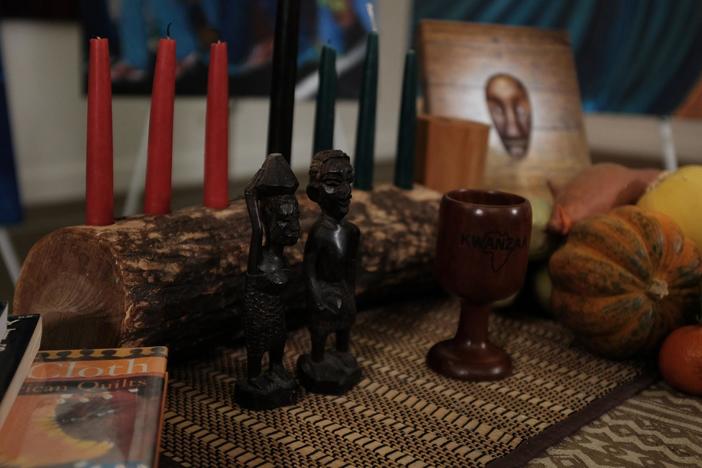 Artist Malik Seneferu dresses a table for Kwanzaa, teaching us the meaning and intention b