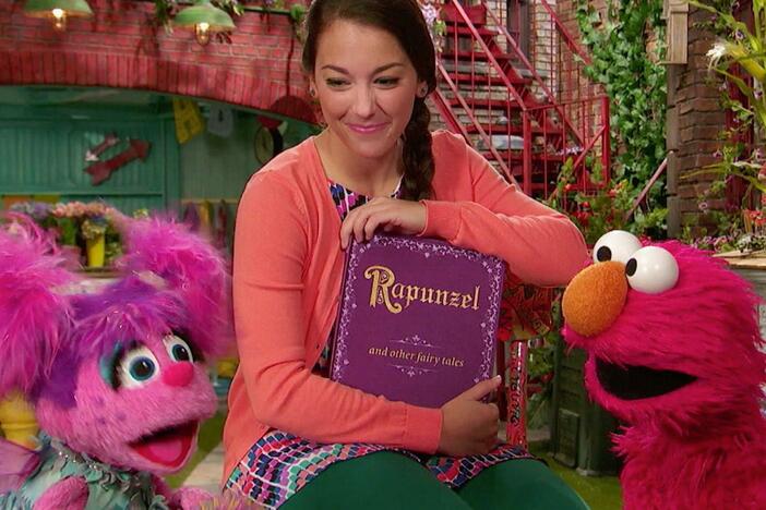 Abby and Elmo help Rapunzel become a gymnast.