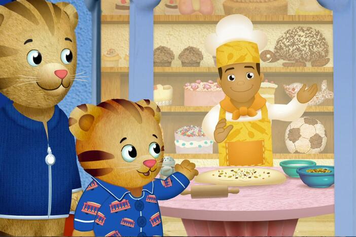 Daniel sees that all of the shops on Main Street are quiet and dark, except the bakery.