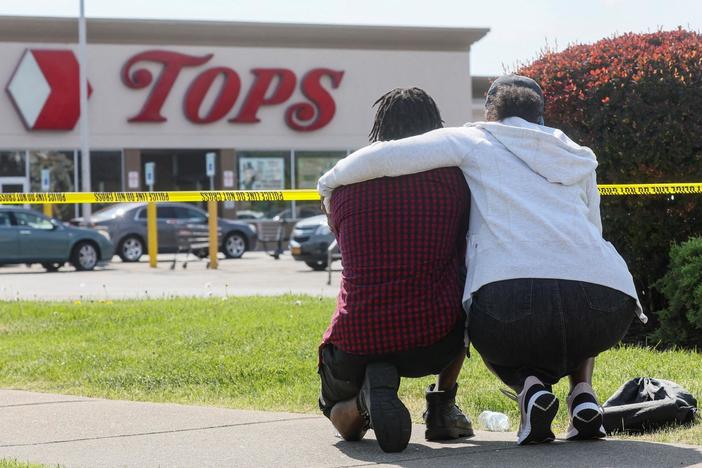 Grief, shock and anger in Buffalo after gunman targets Black community in racist attack