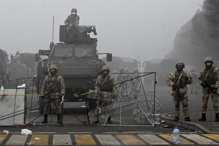 Kazakh president issues 'shoot to kill' order as protesters clash with troops