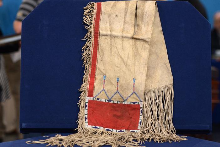 Appraisal: Cheyenne Buffalo Hide & Red Stroud Cloth Saddle Bags, ca. 1875