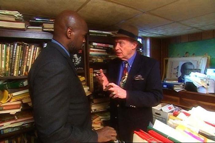 Tukufu speaks to boxing author Bert Sugar.