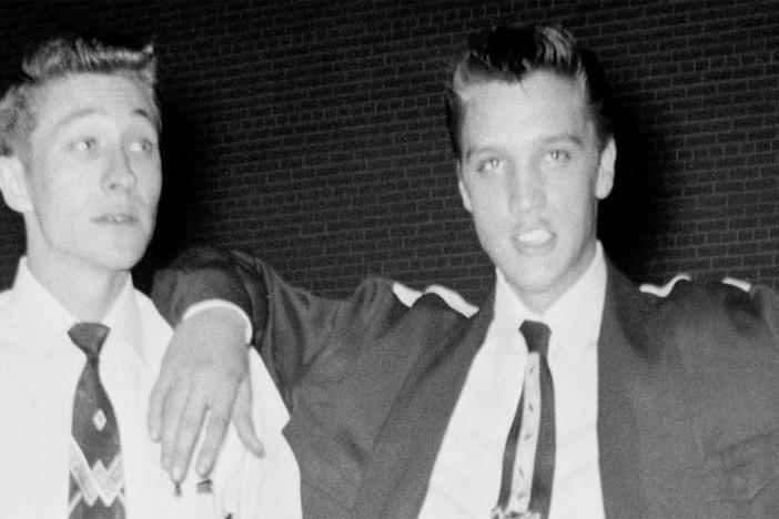 Featured artists remember Elvis Presley and discuss his unique role in American music.