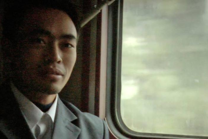 A man becomes frustrated on his trip home through China.