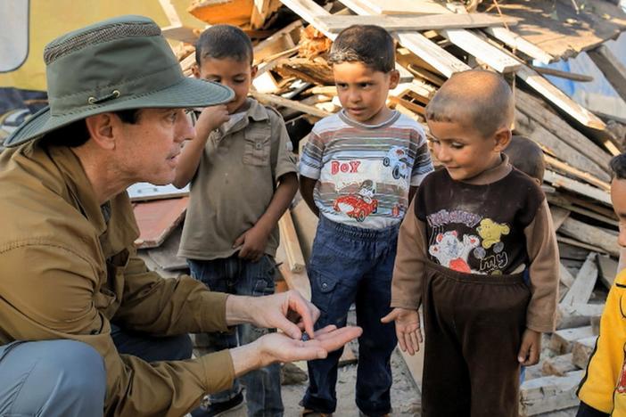 He says humanitarian relief means “bringing the solidarity from one community to another.”