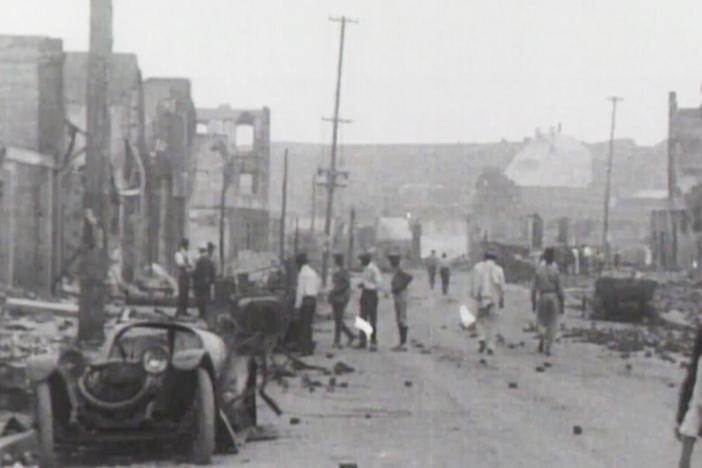 A thriving Black community in Tulsa that rebuilt after a 1921 racially-motivated massacre.