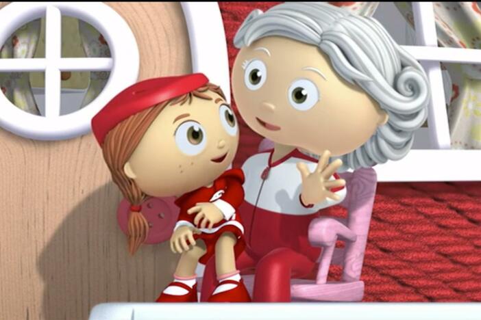 Red gives her grandma a present. 