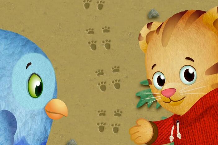 Daniel and O follow the sounds of a woodpecker and the footprints of a squirrel.