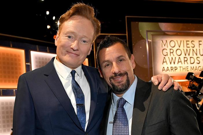 When Adam Sandler comes up too early to accept his award, Conan O'Brien roasts him.
