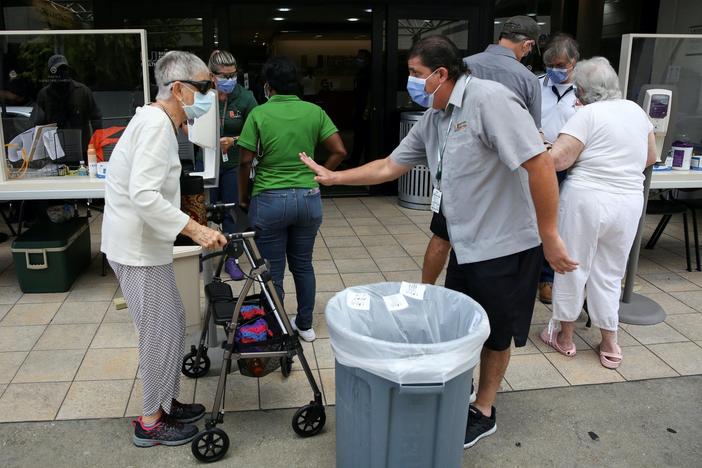 News Wrap: U.S. sees record 50,000 new virus cases in a single day