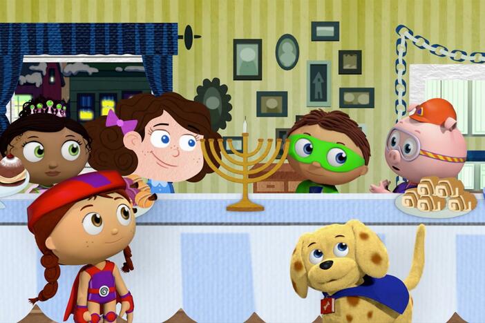 Super Why uses his reading power to change the story and light the menorah.