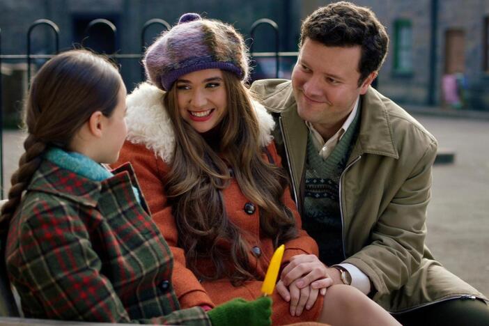 Miss Higgins, Roger, and Nancy team up to break some exciting news to Colette.