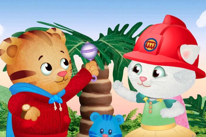 Daniel and Katerina are playing superheroes. They help Mom Tiger who is making a table.