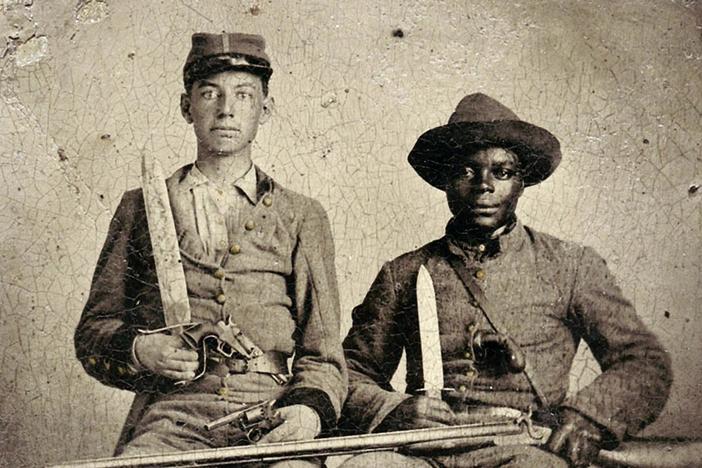 In this rare photo of a black man in a Confederate uniform, was he soldier or slave?