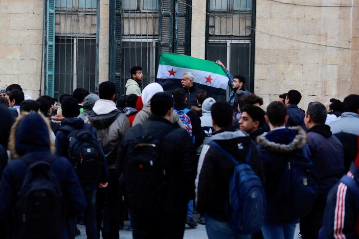 Syrians begin piecing their lives back together a week after rebels overthrow Assad