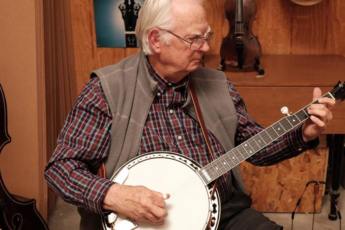 William L. Ellis & his father Tony Ellis on banjos, fiddle and family