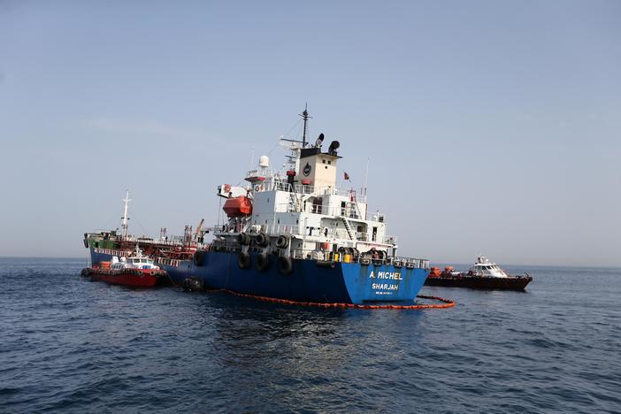 News Wrap: After oil tankers damaged in Persian Gulf, Trump warns Iran
